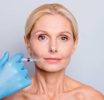 tired looking woman receiving Juvederm treatments